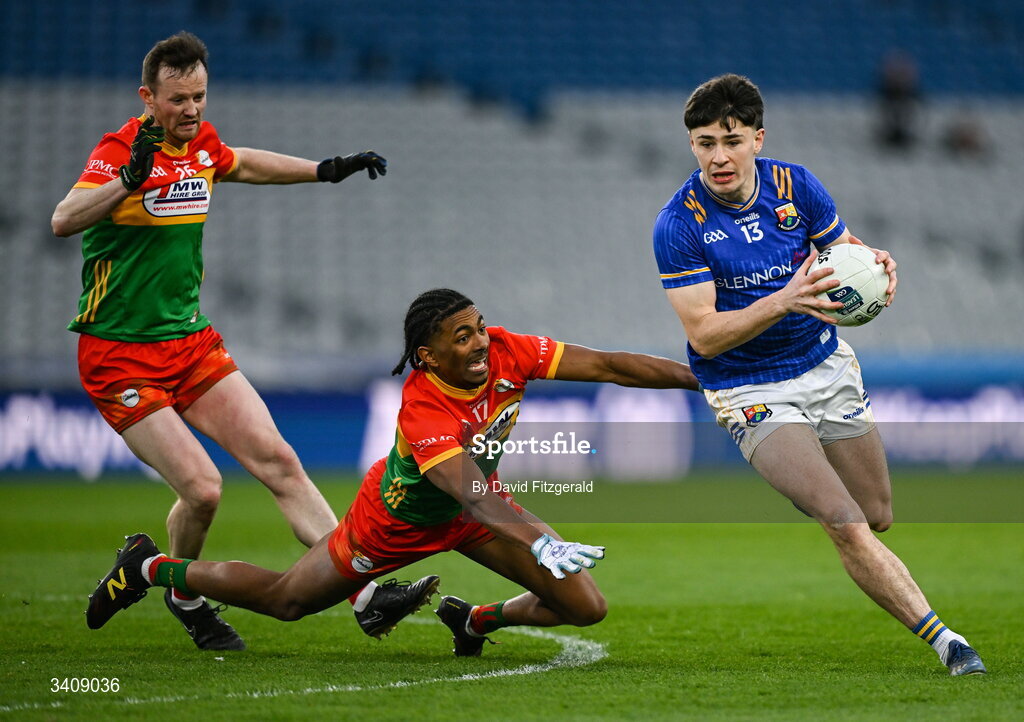 28 March 2026; Dylan Farrell of Longford in action against John Phiri of Carlow during the Allianz Football League Division 4 final match between Carlow and Longford at Croke Park in Dublin. Photo by David Fitzgerald/Sportsfile