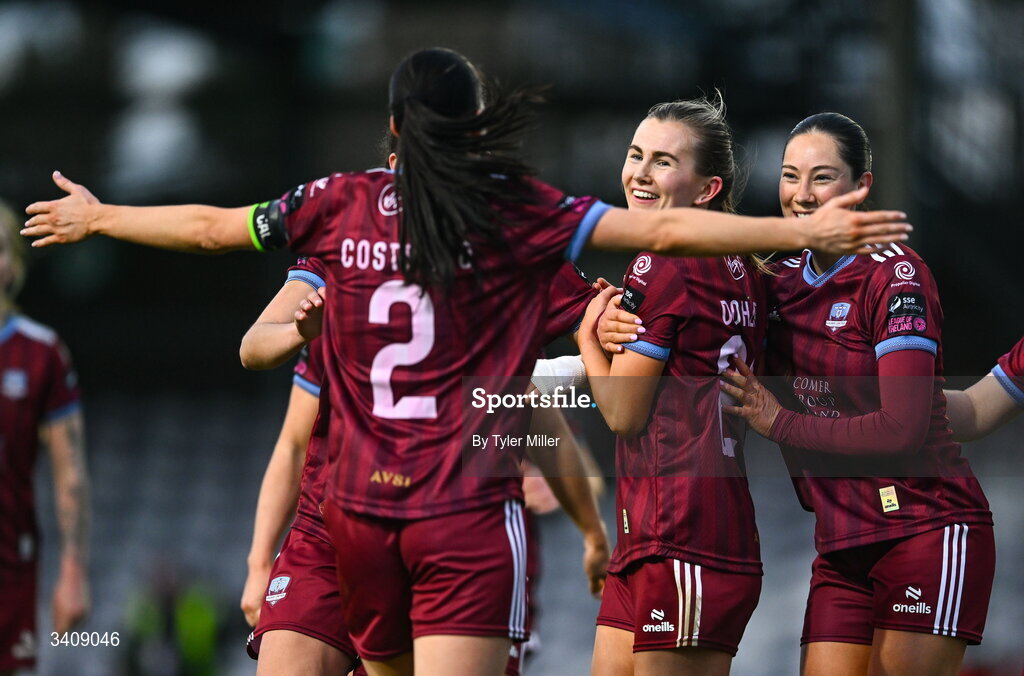 28 March 2026; Emma Doherty of Galway United, centre, celebrates with team-mates, including Aoibhin Donnelly, right, and Aoibheann Costello, 2, after scoring their side's second goal during the SSE Airtricity Women's Premier Division match between Galway United and Wexford at Eamonn Deacy Park in Galway. Photo by Tyler Miller/Sportsfile