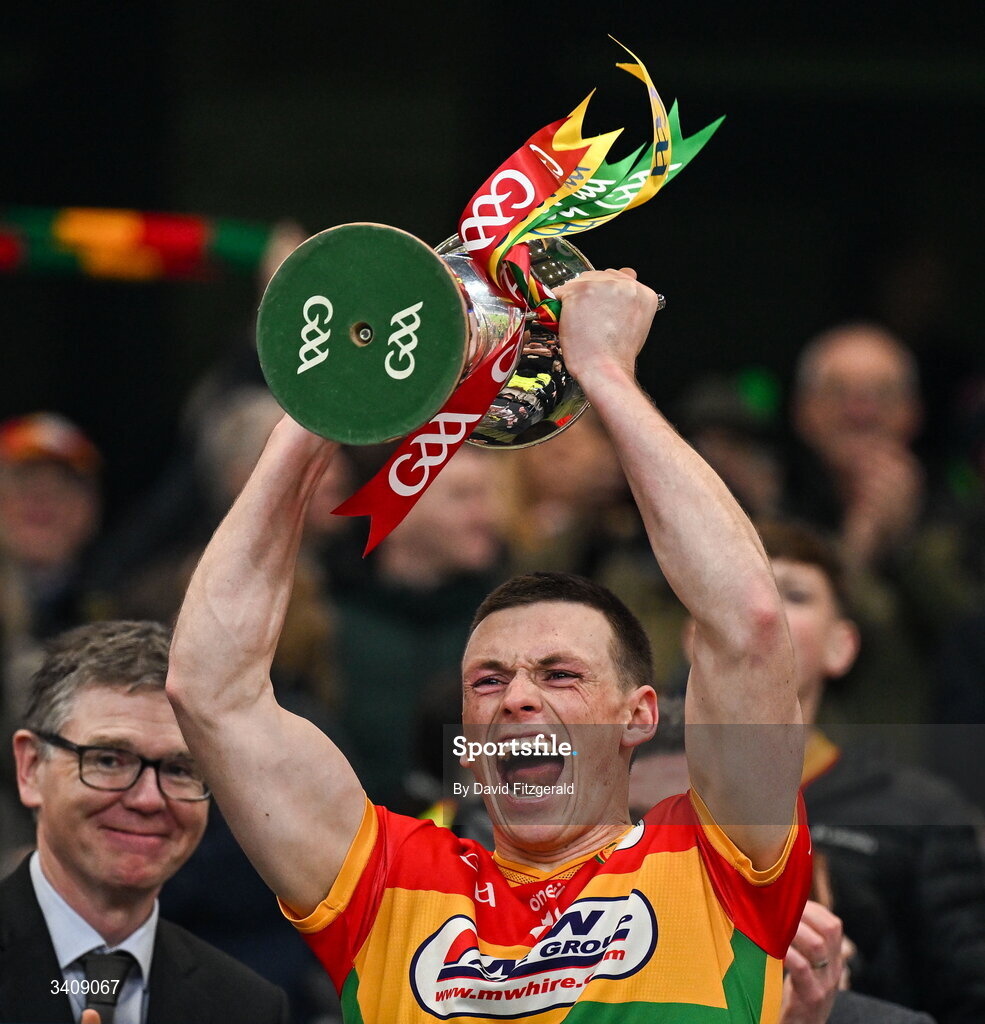 28 March 2026; Carlow captain Mikey Bambrick lifts the cup after the Allianz Football League Division 4 final match between Carlow and Longford at Croke Park in Dublin. Photo by David Fitzgerald/Sportsfile