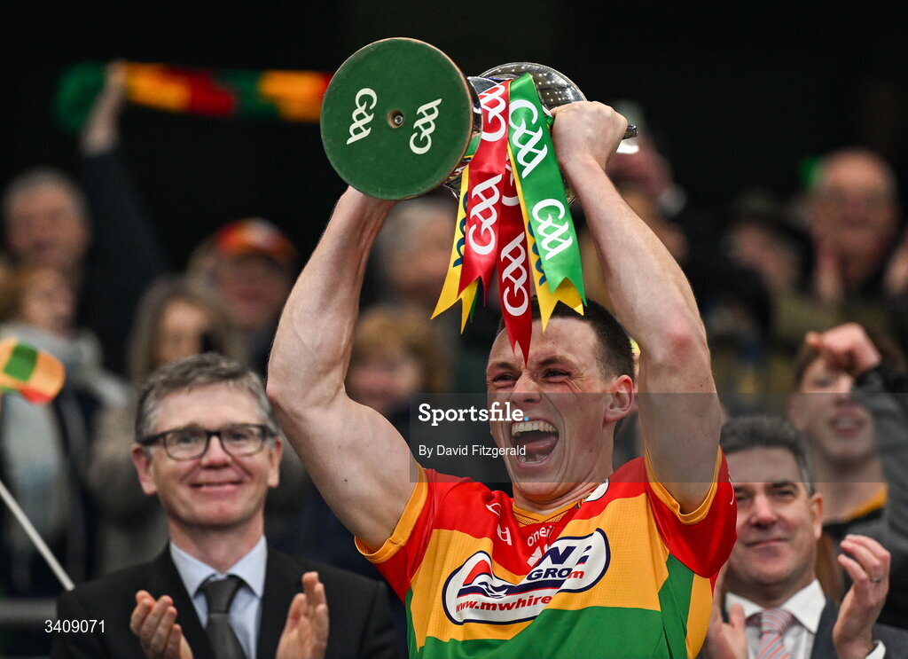 28 March 2026; Carlow captain Mikey Bambrick lifts the cup after the Allianz Football League Division 4 final match between Carlow and Longford at Croke Park in Dublin. Photo by David Fitzgerald/Sportsfile
