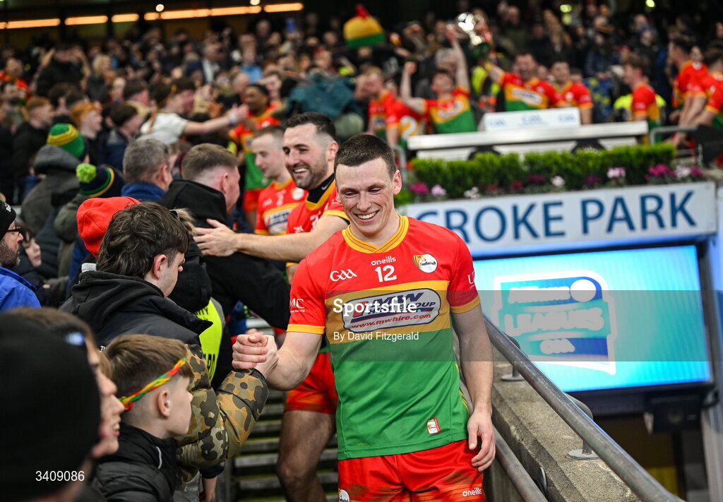 28 March 2026; Mikey Bambrick of Carlow is congratulated by supporters after the Allianz Football League Division 4 final match between Carlow and Longford at Croke Park in Dublin. Photo by David Fitzgerald/Sportsfile