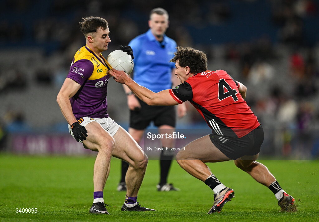 28 March 2026; Seán Nolan of Wexford in action against Pierce Laverty of Down during the Allianz Football League Division 3 final match between Down and Wexford at Croke Park in Dublin. Photo by David Fitzgerald/Sportsfile