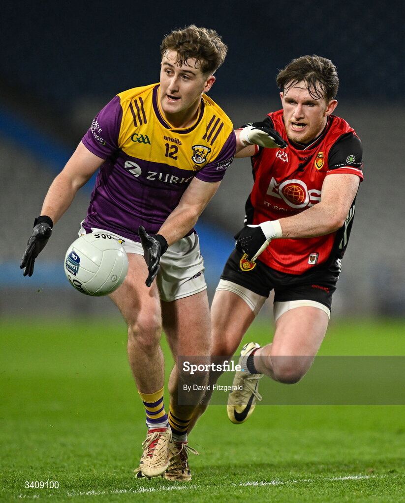 28 March 2026; Jack Higgins of Wexford in action against Miceal Rooney of Down during the Allianz Football League Division 3 final match between Down and Wexford at Croke Park in Dublin. Photo by David Fitzgerald/Sportsfile