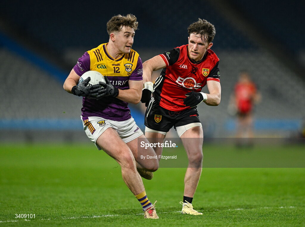 28 March 2026; Jack Higgins of Wexford in action against Miceal Rooney of Down during the Allianz Football League Division 3 final match between Down and Wexford at Croke Park in Dublin. Photo by David Fitzgerald/Sportsfile