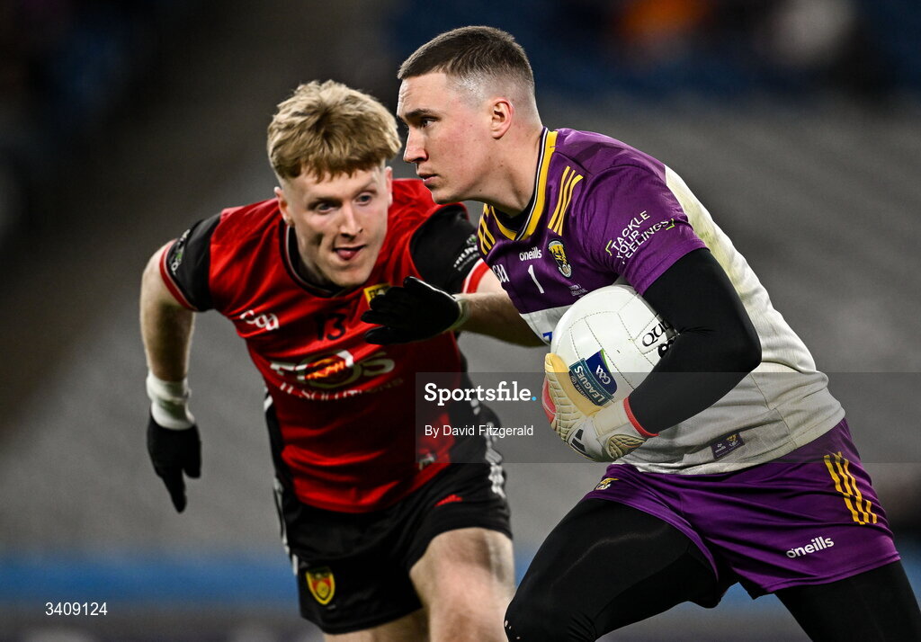 28 March 2026; Wexford goalkeeper Darragh Brooks in action against Adam Crimmins of Down during the Allianz Football League Division 3 final match between Down and Wexford at Croke Park in Dublin. Photo by David Fitzgerald/Sportsfile