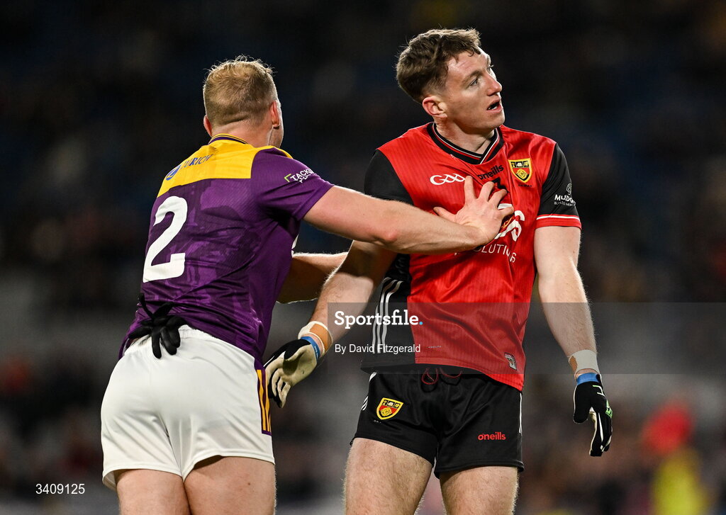 28 March 2026; Adam Crimmins of Down in action against Shane Doyle of Wexford during the Allianz Football League Division 3 final match between Down and Wexford at Croke Park in Dublin. Photo by David Fitzgerald/Sportsfile