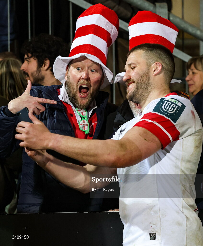 28 March 2026; Stuart McCloskey of Ulster takes a selfie with supporters after the United Rugby Championship match between Zebre and Ulster at Stadio Lanfranchi in Parma, Italy. Photo by Tim Rogers/Sportsfile