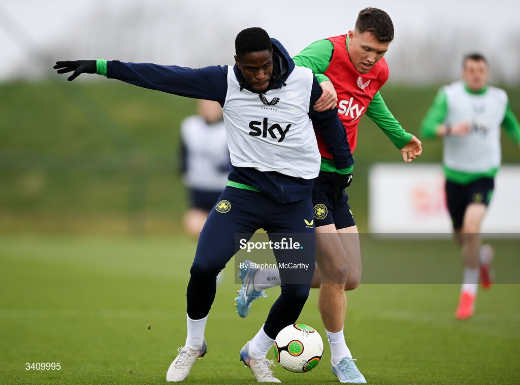 30 March 2026; Chiedozie Ogbene and Dara O'Shea, right, during a Republic of Ireland men's training session at the FAI National Training Centre in Abbotstown, Dublin. Photo by Stephen McCarthy/Sportsfile