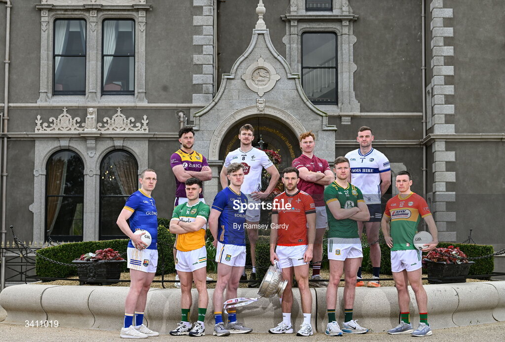 31 March 2026; Players, from left, Paddy Fox, Longford; Eoghan Nolan, Wexford; Shane Tierney, Offaly; Dean Healy, Wicklow; Kevin Feely, Kildare; Sam Mulroy, Louth; Ronan Wallace, Westmeath; Cian McBride, Meath; Killian Roche, Laois; and Mikey Bambrick, Carlow; during the launch of the 2026 Leinster GAA Senior Football Championships at Killashee Hotel in Naas, Kildare. Photo by Ramsey Cardy/Sportsfile