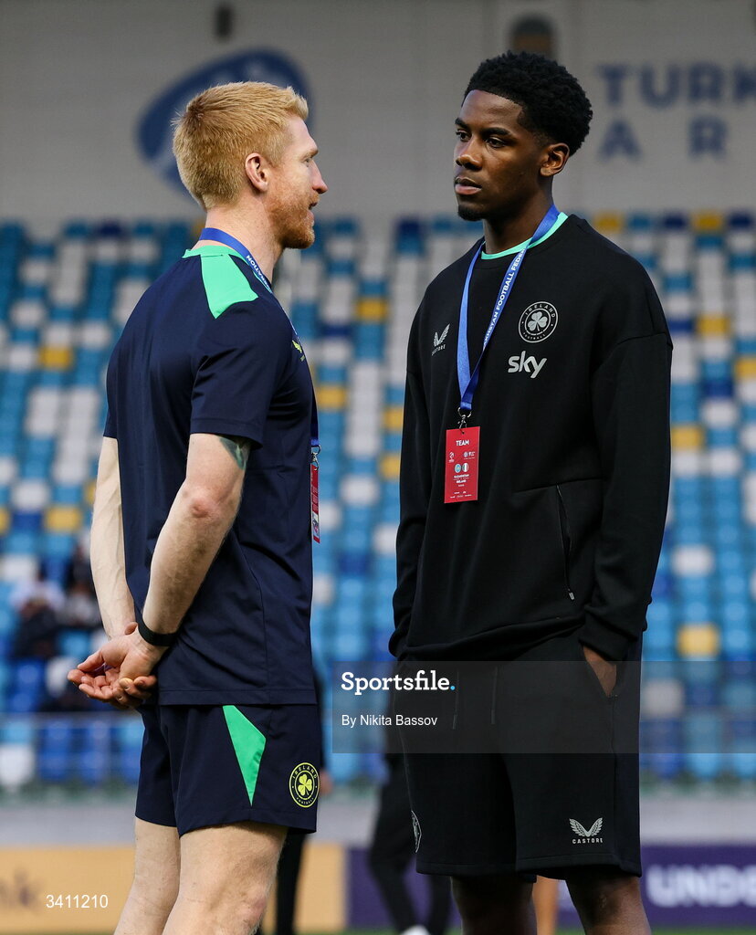 31 March 2026; Republic of Ireland coach Paul McShane, left, with Romeo Akachukwu of Republic of Ireland before the UEFA European U21 Championship qualifier match between Kazakhstan and Republic of Ireland at Turkistan Arena in Turkeistan, Kazakhstan. Photo by Nikita Bassov/Sportsfile