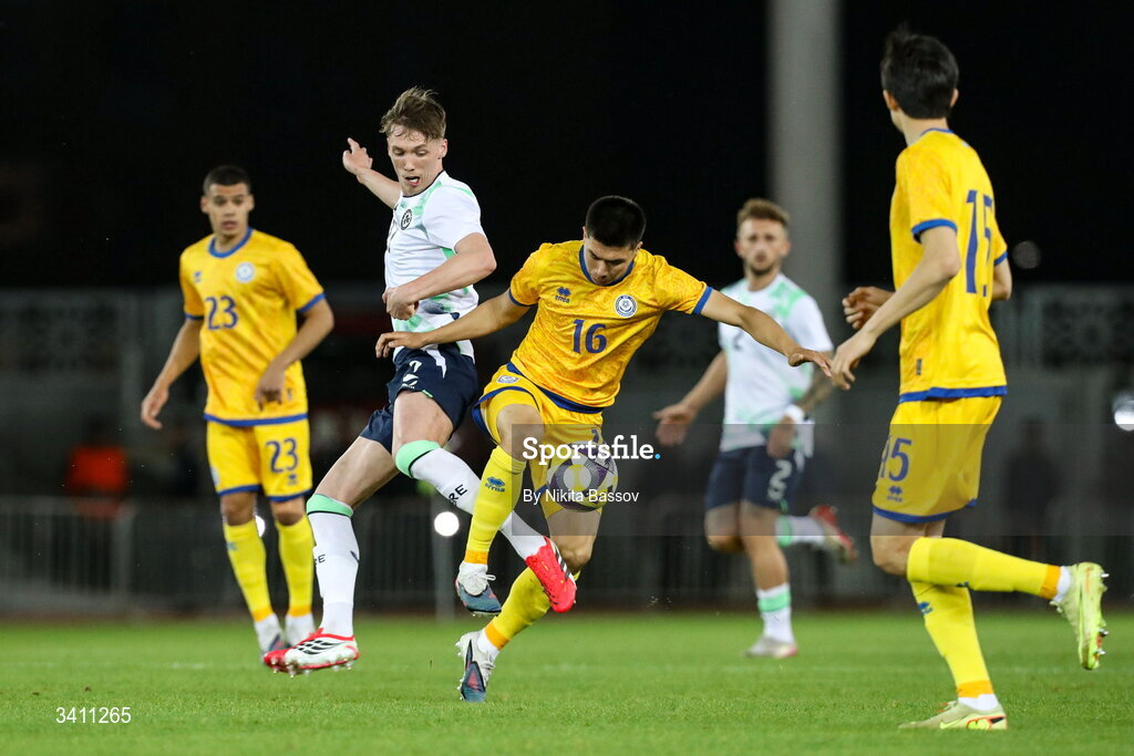 31 March 2026; Zhansultan Mukhametkhanov of Kazakhstan in action against Oisin Gallagher of Republic of Ireland during the UEFA European U21 Championship qualifier match between Kazakhstan and Republic of Ireland at Turkistan Arena in Turkeistan, Kazakhstan. Photo by Nikita Bassov/Sportsfile