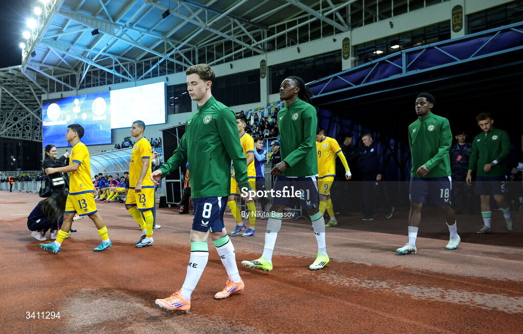 31 March 2026; Republic of Ireland players, from left, Jamie Mullins, Jaden Umeh and Romeo Akachukwu walk out before the UEFA European U21 Championship qualifier match between Kazakhstan and Republic of Ireland at Turkistan Arena in Turkeistan, Kazakhstan. Photo by Nikita Bassov/Sportsfile