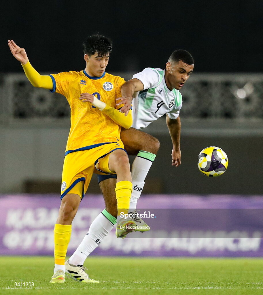 31 March 2026; David Okagbue of Republic of Ireland in action against Ramazan Bagdat of Kazakhstan during the UEFA European U21 Championship qualifier match between Kazakhstan and Republic of Ireland at Turkistan Arena in Turkeistan, Kazakhstan. Photo by Nikita Bassov/Sportsfile