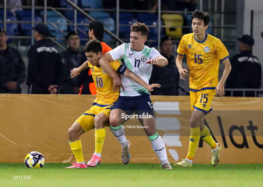 31 March 2026; Tommy Lonegran of Republic of Ireland in action against Abinur Nurymbet of Kazakhstan during the UEFA European U21 Championship qualifier match between Kazakhstan and Republic of Ireland at Turkistan Arena in Turkeistan, Kazakhstan. Photo by Nikita Bassov/Sportsfile