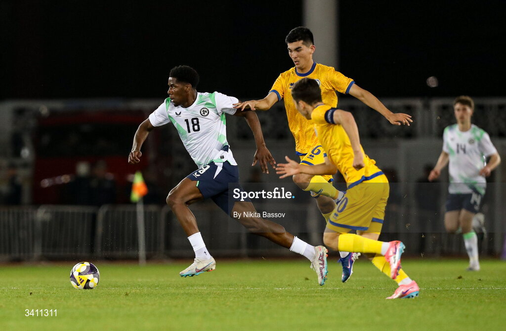31 March 2026; Romeo Akachukwu of Republic of Ireland in action against Salamat Zhumabekov, right, and Abinur Nurymbet of Kazakhstan during the UEFA European U21 Championship qualifier match between Kazakhstan and Republic of Ireland at Turkistan Arena in Turkeistan, Kazakhstan. Photo by Nikita Bassov/Sportsfile