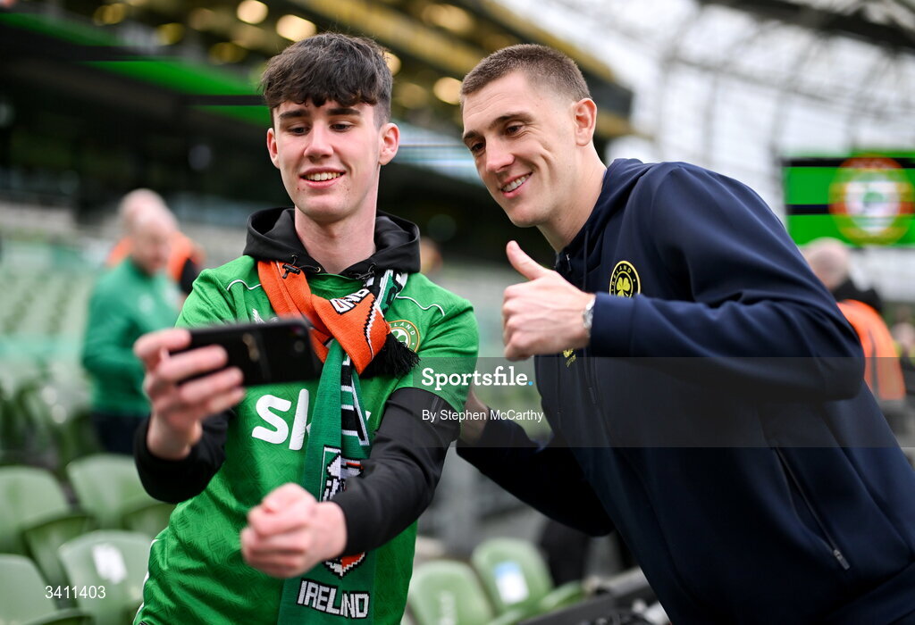 31 March 2026; Republic of Ireland supporter Alex Barry takes a selfie with Jimmy Dunne of Republic of Ireland before the international friendly match between Republic of Ireland and North Macedonia at Aviva Stadium in Dublin. Photo by Stephen McCarthy/Sportsfile