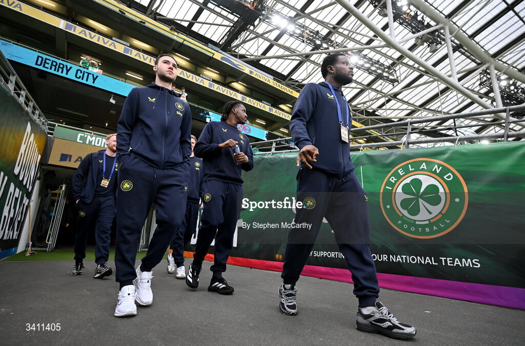 31 March 2026; Republic of Ireland players, from left, Harvey Vale, Bosun Lawal and Millenic Alli walk the pitch upon arrival before the international friendly match between Republic of Ireland and North Macedonia at Aviva Stadium in Dublin. Photo by Stephen McCarthy/Sportsfile