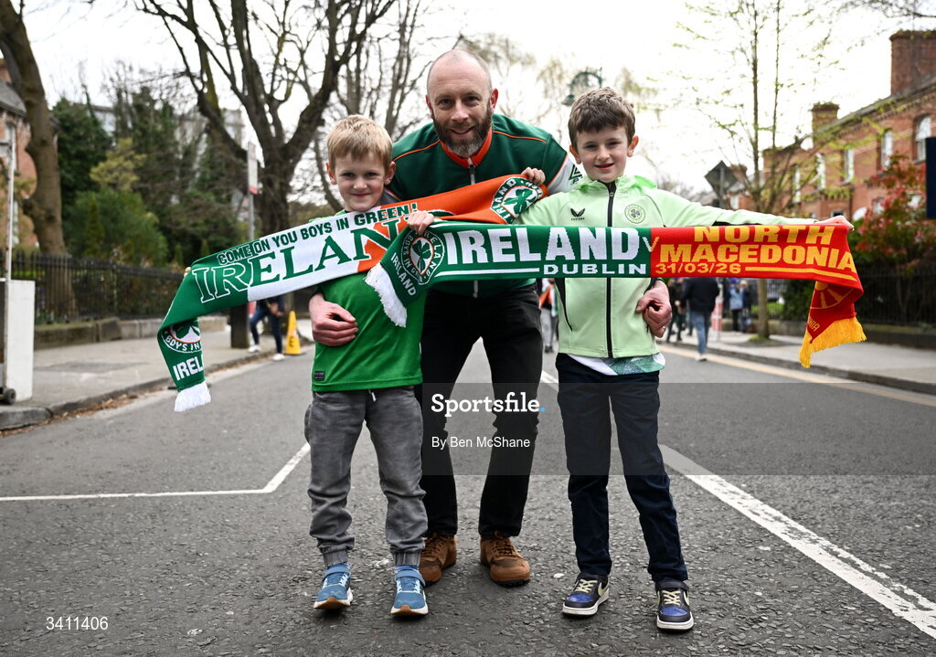 31 March 2026; Republic of Ireland supporters Michael Dillon, with Fionn, left, age 4, and Odhran, age 6, from Tipperary, before the international friendly match between Republic of Ireland and North Macedonia at Aviva Stadium in Dublin. Photo by Ben McShane/Sportsfile