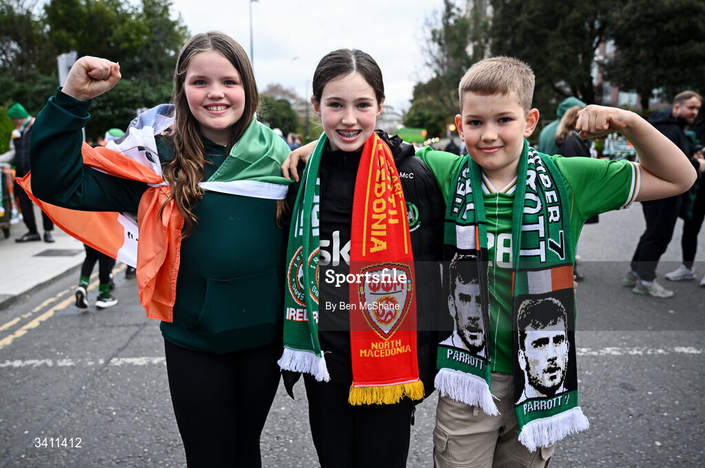 31 March 2026; Republic of Ireland supporters, from left, Robyn, age 11, Layla, age 11 and NJ McCormack, age 10, from Dublin, before the international friendly match between Republic of Ireland and North Macedonia at Aviva Stadium in Dublin. Photo by Ben McShane/Sportsfile