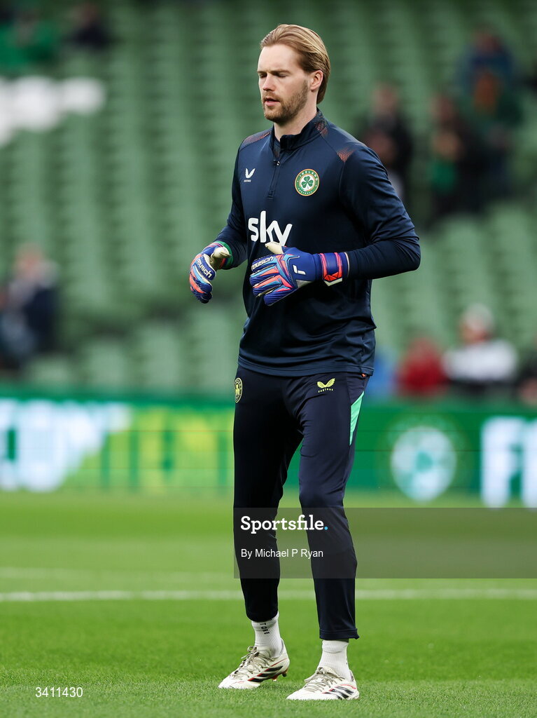 31 March 2026; Republic of Ireland goalkeeper Caoimhin Kelleher warms up before the international friendly match between Republic of Ireland and North Macedonia at Aviva Stadium in Dublin. Photo by Michael P Ryan/Sportsfile