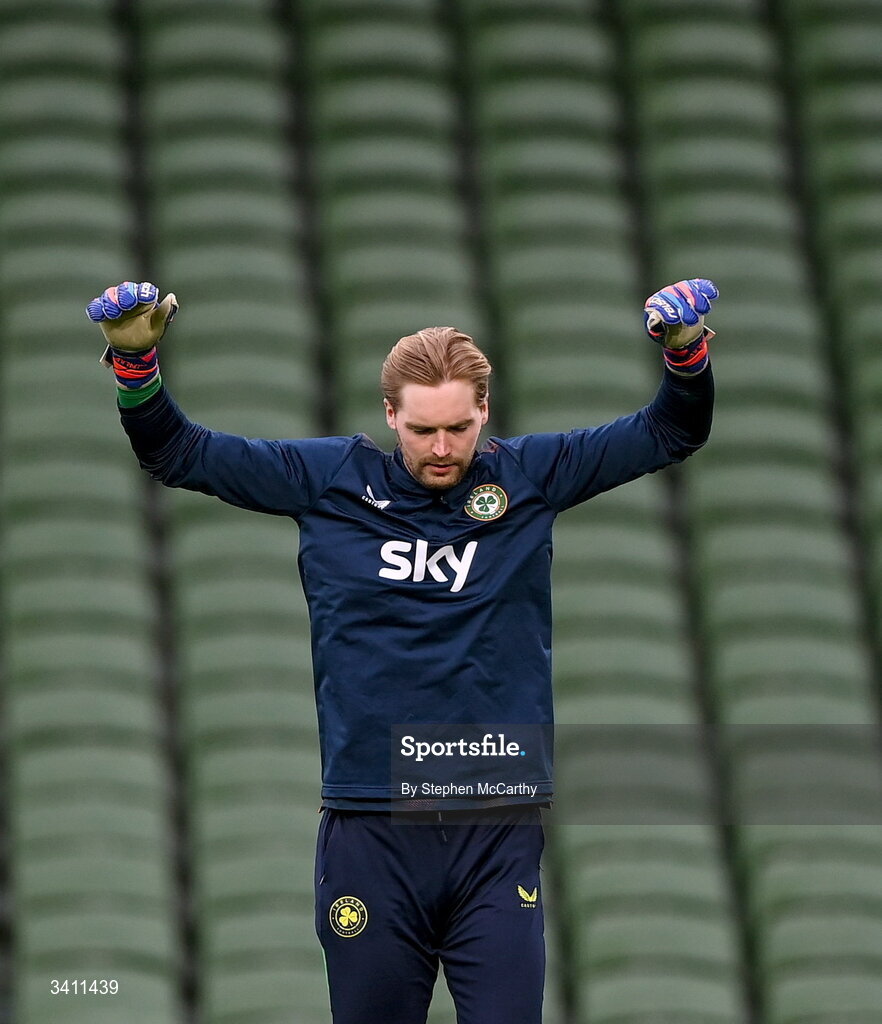 31 March 2026; Republic of Ireland goalkeeper Caoimhin Kelleher warms up before the international friendly match between Republic of Ireland and North Macedonia at Aviva Stadium in Dublin. Photo by Stephen McCarthy/Sportsfile