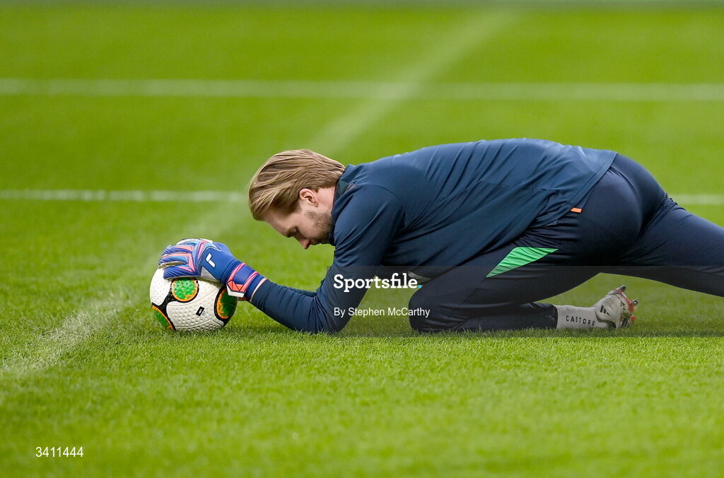 31 March 2026; Republic of Ireland goalkeeper Caoimhin Kelleher warms up before the international friendly match between Republic of Ireland and North Macedonia at Aviva Stadium in Dublin. Photo by Stephen McCarthy/Sportsfile