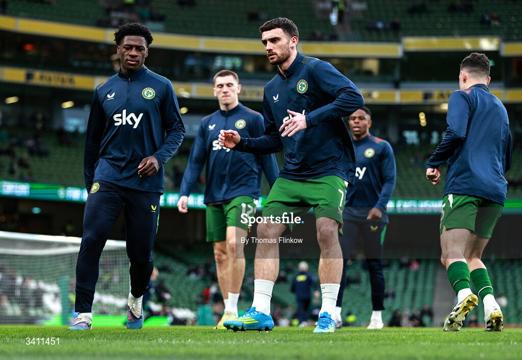 31 March 2026; Republic of Ireland players, including Troy Parrott, centre, warm up before the international friendly match between Republic of Ireland and North Macedonia at Aviva Stadium in Dublin. Photo by Thomas Flinkow/Sportsfile