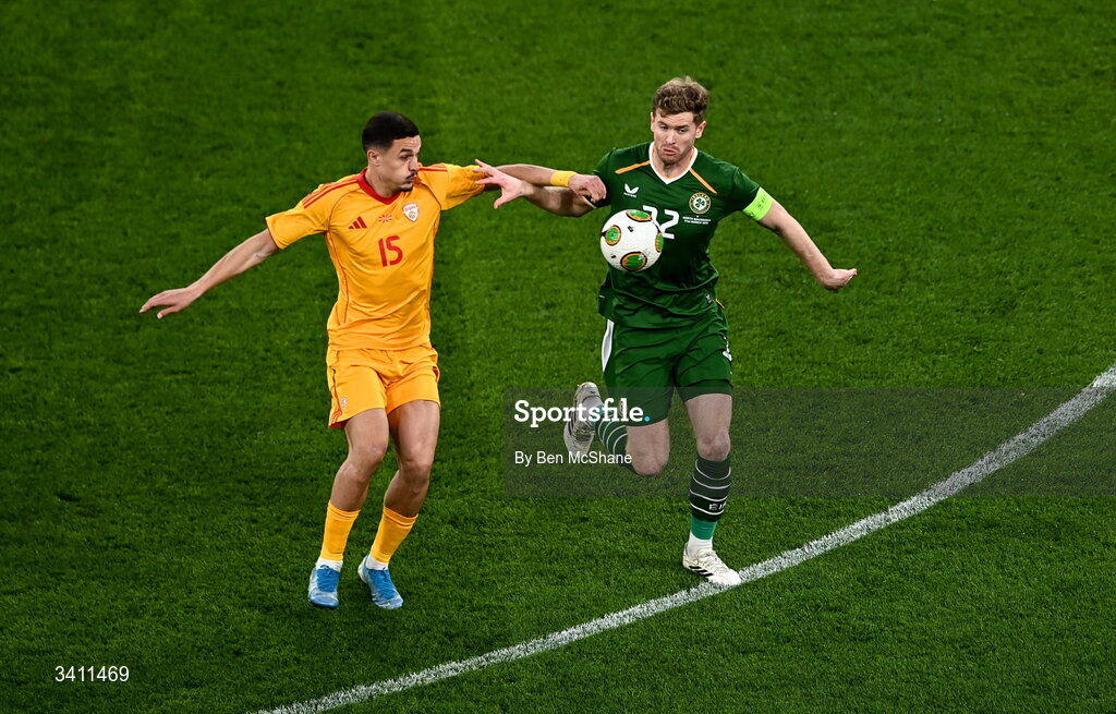 31 March 2026; Elmin Rastoder of North Macedonia in action against Nathan Collins of Republic of Ireland during the international friendly match between Republic of Ireland and North Macedonia at Aviva Stadium in Dublin. Photo by Ben McShane/Sportsfile