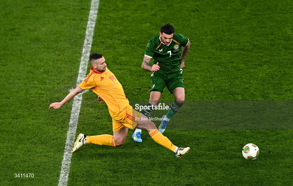 31 March 2026; Troy Parrott of Republic of Ireland is tackled by Elmin Rastoder of North Macedonia during the international friendly match between Republic of Ireland and North Macedonia at Aviva Stadium in Dublin. Photo by Ben McShane/Sportsfile