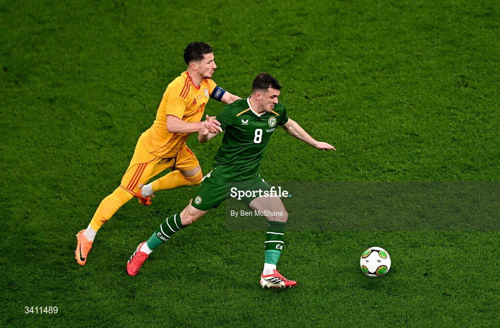 31 March 2026; Jason Knight of Republic of Ireland is tackled by Enis Bardhi of North Macedonia during the international friendly match between Republic of Ireland and North Macedonia at Aviva Stadium in Dublin. Photo by Ben McShane/Sportsfile