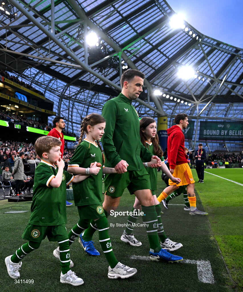 31 March 2026; Seamus Coleman of Republic of Ireland makes his way onto the pitch with his children, from left, Blake, Ellie and Lily before the international friendly match between Republic of Ireland and North Macedonia at Aviva Stadium in Dublin. Photo by Stephen McCarthy/Sportsfile