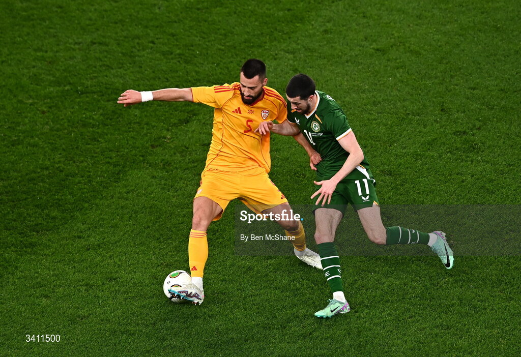 31 March 2026; Gjoko Zajkov of North Macedonia in action against Finn Azaz of Republic of Ireland during the international friendly match between Republic of Ireland and North Macedonia at Aviva Stadium in Dublin. Photo by Ben McShane/Sportsfile