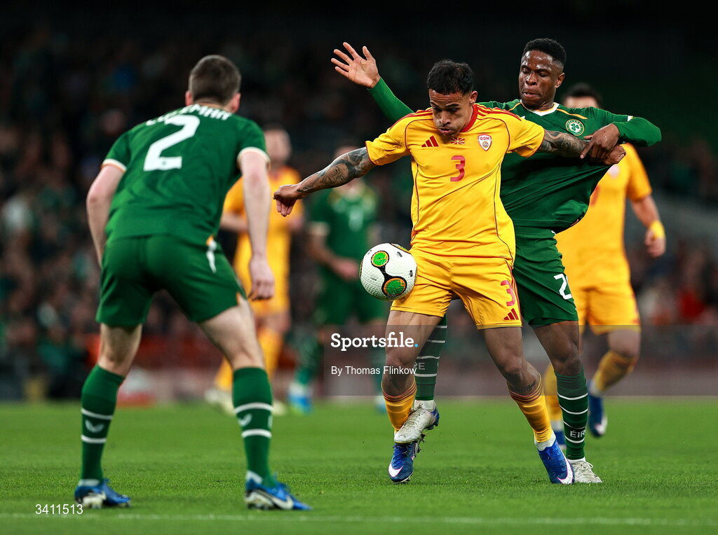 31 March 2026; Sebastijan Herera of North Macedonia in action against Chiedozie Ogbene of Republic of Ireland during the international friendly match between Republic of Ireland and North Macedonia at Aviva Stadium in Dublin. Photo by Thomas Flinkow/Sportsfile