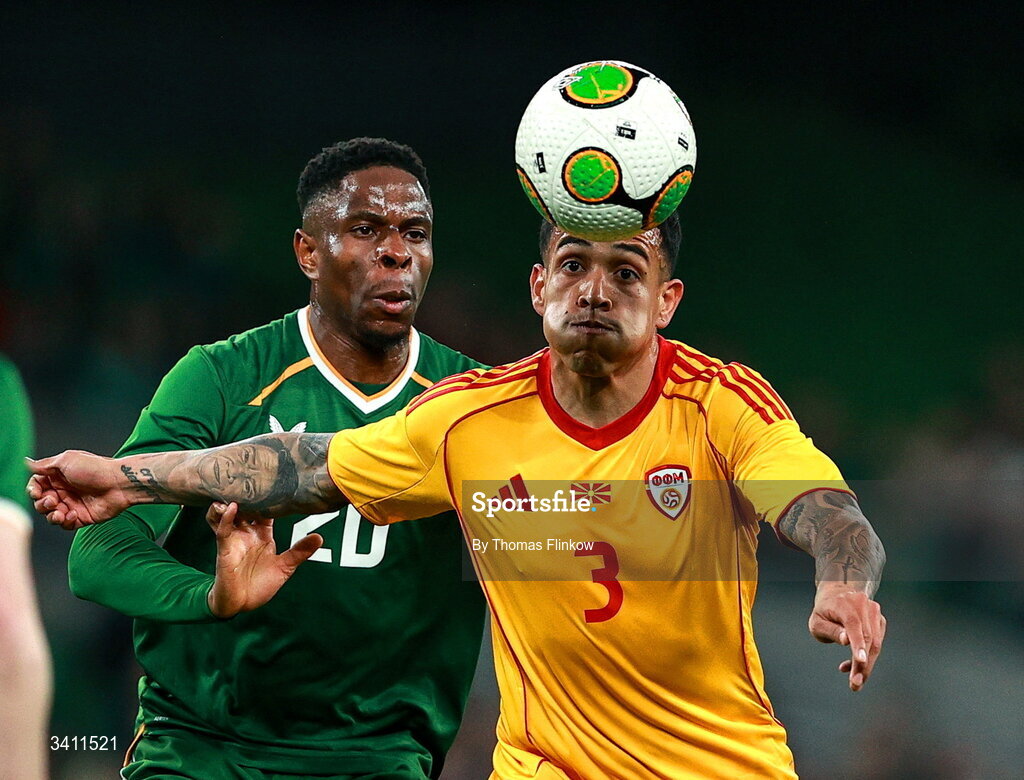31 March 2026; Sebastijan Herera of North Macedonia in action against Chiedozie Ogbene of Republic of Ireland during the international friendly match between Republic of Ireland and North Macedonia at Aviva Stadium in Dublin. Photo by Thomas Flinkow/Sportsfile