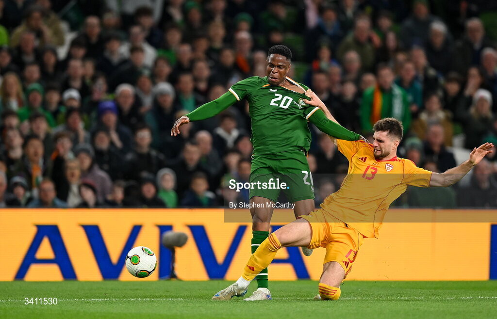 31 March 2026; Chiedozie Ogbene of Republic of Ireland is tackled by Imran Fetai of North Macedonia during the international friendly match between Republic of Ireland and North Macedonia at Aviva Stadium in Dublin. Photo by Stephen McCarthy/Sportsfile
