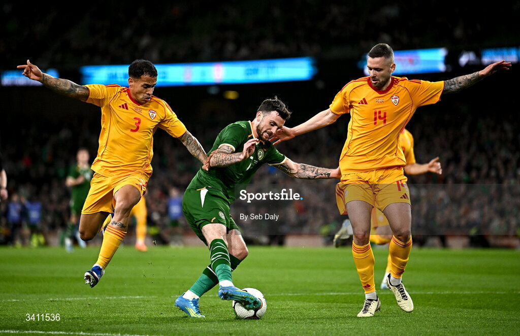 31 March 2026; Troy Parrott of Republic of Ireland is tackled by Sebastijan Herera, left, and Darko Velkovski of North Macedonia during the international friendly match between Republic of Ireland and North Macedonia at the Aviva Stadium in Dublin. Photo by Seb Daly/Sportsfile