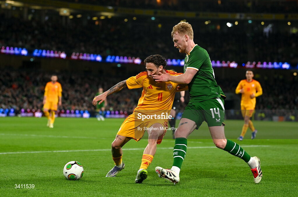31 March 2026; Darko Churlinov of North Macedonia is tackled by Liam Scales of Republic of Ireland during the international friendly match between Republic of Ireland and North Macedonia at Aviva Stadium in Dublin. Photo by Stephen McCarthy/Sportsfile