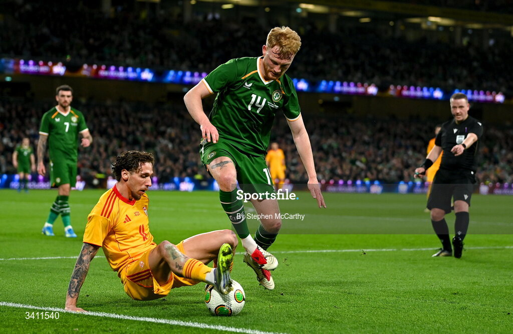 31 March 2026; Liam Scales of Republic of Ireland is tackled by Darko Churlinov of North Macedonia during the international friendly match between Republic of Ireland and North Macedonia at Aviva Stadium in Dublin. Photo by Stephen McCarthy/Sportsfile