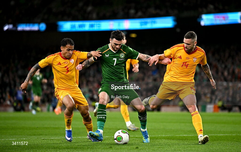 31 March 2026; Troy Parrott of Republic of Ireland is tackled by Sebastijan Herera, left, and Darko Velkovski of North Macedonia during the international friendly match between Republic of Ireland and North Macedonia at the Aviva Stadium in Dublin. Photo by Seb Daly/Sportsfile