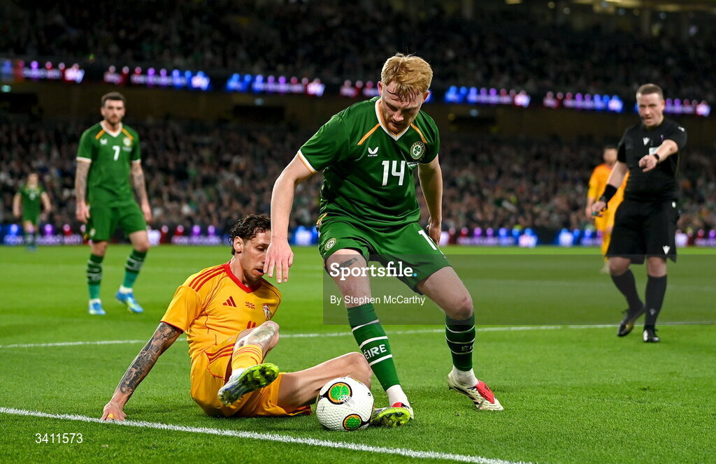 31 March 2026; Liam Scales of Republic of Ireland is tackled by Darko Churlinov of North Macedonia during the international friendly match between Republic of Ireland and North Macedonia at Aviva Stadium in Dublin. Photo by Stephen McCarthy/Sportsfile