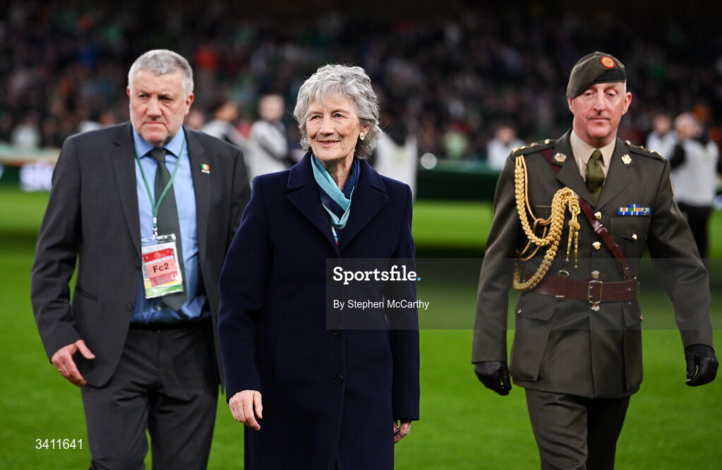 31 March 2026; President of Ireland Catherine Connolly is accompanied by FAI president Paul Cooke after meeting the teams before the international friendly match between Republic of Ireland and North Macedonia at Aviva Stadium in Dublin. Photo by Stephen McCarthy/Sportsfile