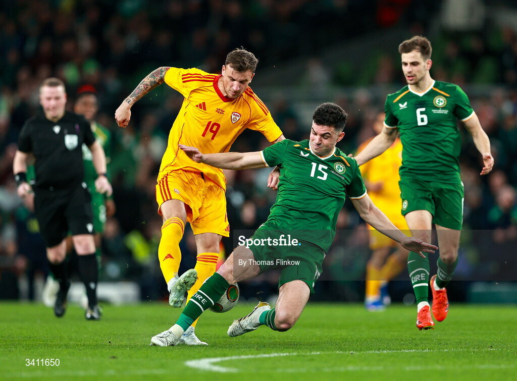 31 March 2026; John Egan of Republic of Ireland blocks a shot from Milan Ristovski of North Macedonia during the international friendly match between Republic of Ireland and North Macedonia at Aviva Stadium in Dublin. Photo by Thomas Flinkow/Sportsfile