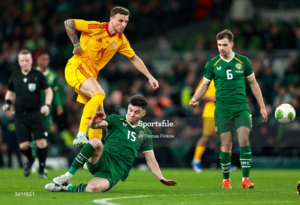 31 March 2026; John Egan of Republic of Ireland in action against Milan Ristovski of North Macedonia during the international friendly match between Republic of Ireland and North Macedonia at Aviva Stadium in Dublin. Photo by Thomas Flinkow/Sportsfile