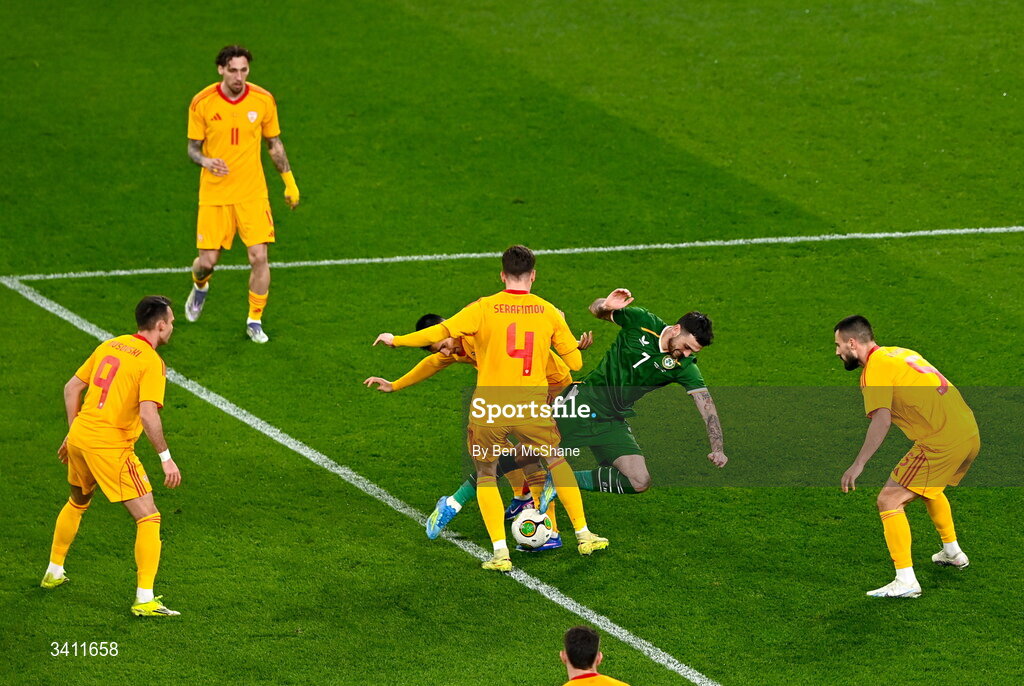 31 March 2026; Troy Parrott of Republic of Ireland is tackled by Andrej Stojchevski and Nikola Serafimov of North Macedonia during the international friendly match between Republic of Ireland and North Macedonia at Aviva Stadium in Dublin. Photo by Ben McShane/Sportsfile