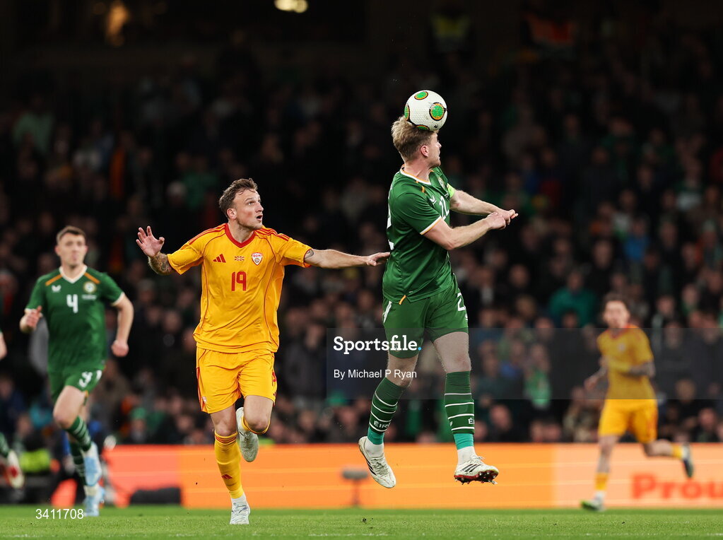 31 March 2026; Nathan Collins of Republic of Ireland in action against Milan Ristovski of North Macedonia during the international friendly match between Republic of Ireland and North Macedonia at Aviva Stadium in Dublin. Photo by Michael P Ryan/Sportsfile
