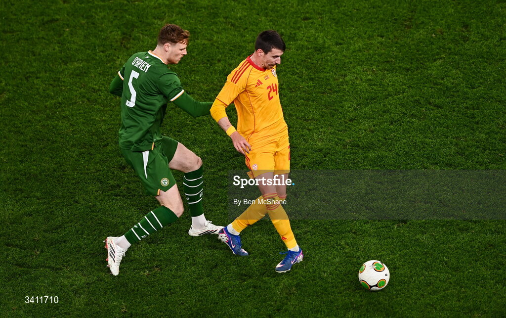 31 March 2026; Ljupche Doriev of North Macedonia in action against Jake O'Brien of Republic of Ireland during the international friendly match between Republic of Ireland and North Macedonia at Aviva Stadium in Dublin. Photo by Ben McShane/Sportsfile