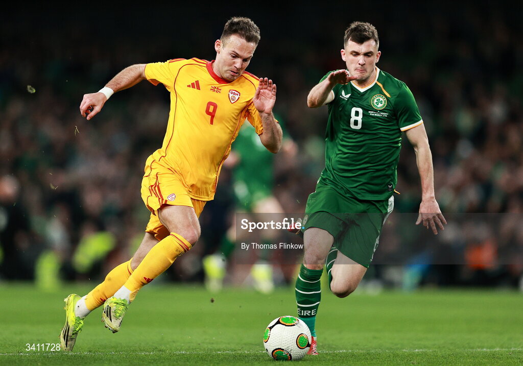 31 March 2026; Daniel Musovski of North Macedonia in action against Jason Knight of Republic of Ireland during the international friendly match between Republic of Ireland and North Macedonia at Aviva Stadium in Dublin. Photo by Thomas Flinkow/Sportsfile