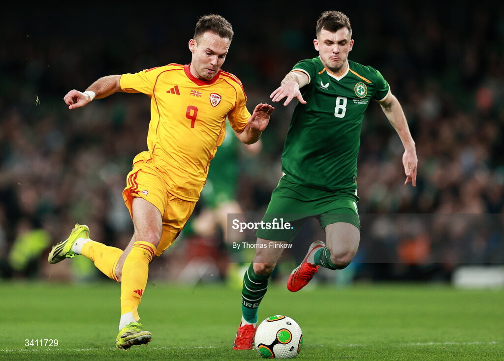 31 March 2026; Daniel Musovski of North Macedonia in action against Jason Knight of Republic of Ireland during the international friendly match between Republic of Ireland and North Macedonia at Aviva Stadium in Dublin. Photo by Thomas Flinkow/Sportsfile