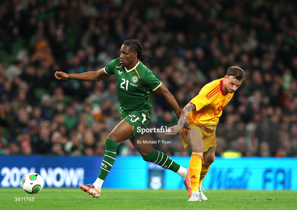 31 March 2026; Bosun Lawal of Republic of Ireland in action against Milan Ristovski of North Macedonia during the international friendly match between Republic of Ireland and North Macedonia at Aviva Stadium in Dublin. Photo by Michael P Ryan/Sportsfile