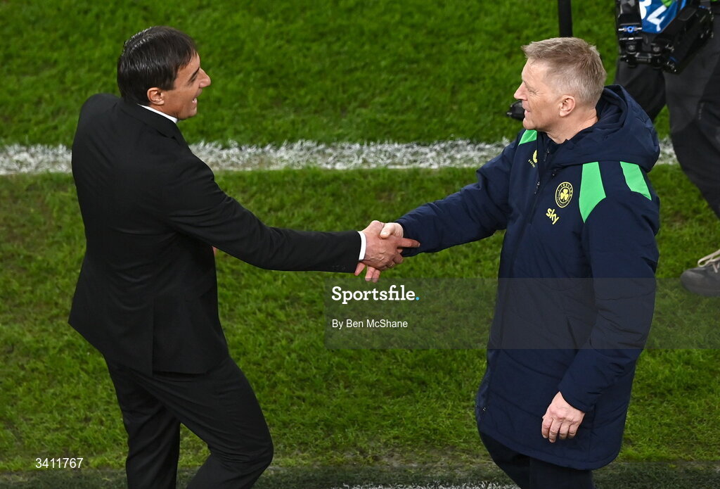 31 March 2026; Republic of Ireland head coach Heimir Hallgrimsson, right, and North Macedonia head coach Goce Sedloski after the international friendly match between Republic of Ireland and North Macedonia at Aviva Stadium in Dublin. Photo by Ben McShane/Sportsfile